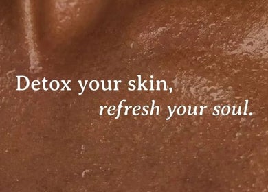 Mudita Rituals spa in Bali showcases detox treatment message on textured background.