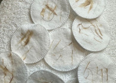 Cotton pads with hair at KJ Beauty Studio, Mount Helen, Victoria, AU showcasing precise beauty care.
