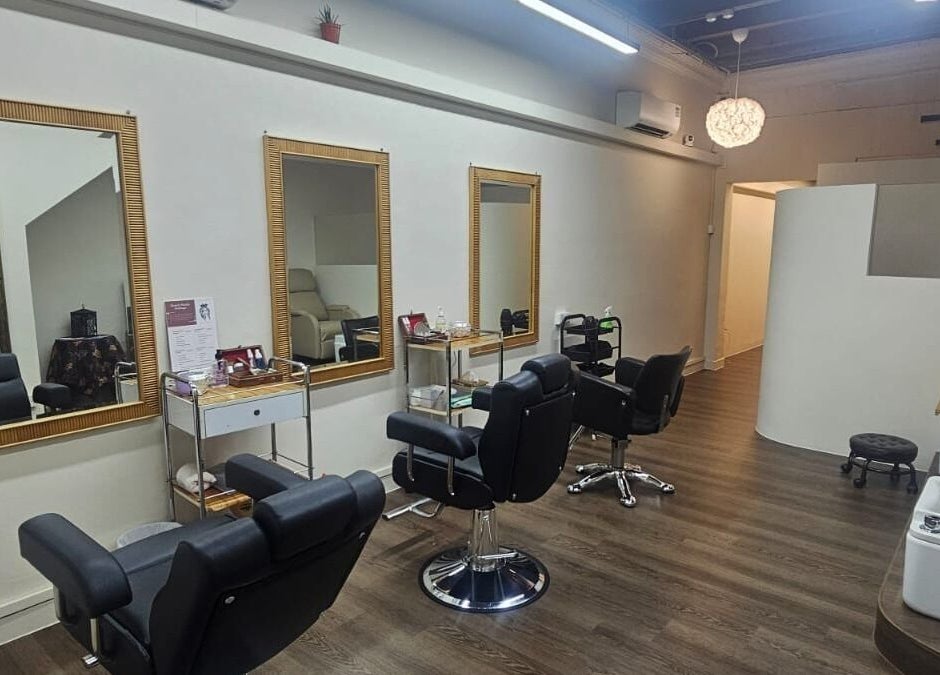 Modern salon chairs and mirrors at Beauty by Devi, Singapore, Singapore, SG.