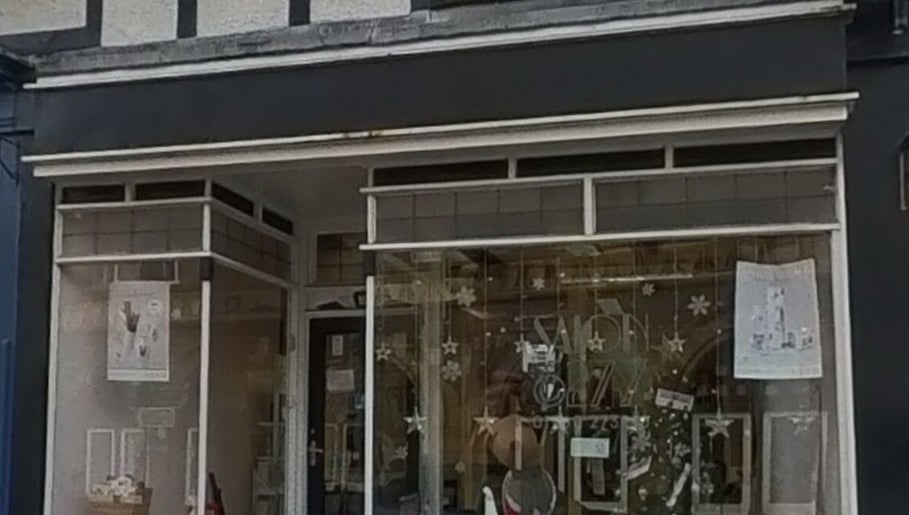 Front view of KM Sculpt & Glow beauty salon in Congleton, England, GB with elegant signage and window display.