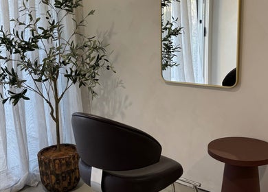 Elegant salon corner with chair and mirror at Hair by Holly Stewart, Nambour, Queensland, AU.