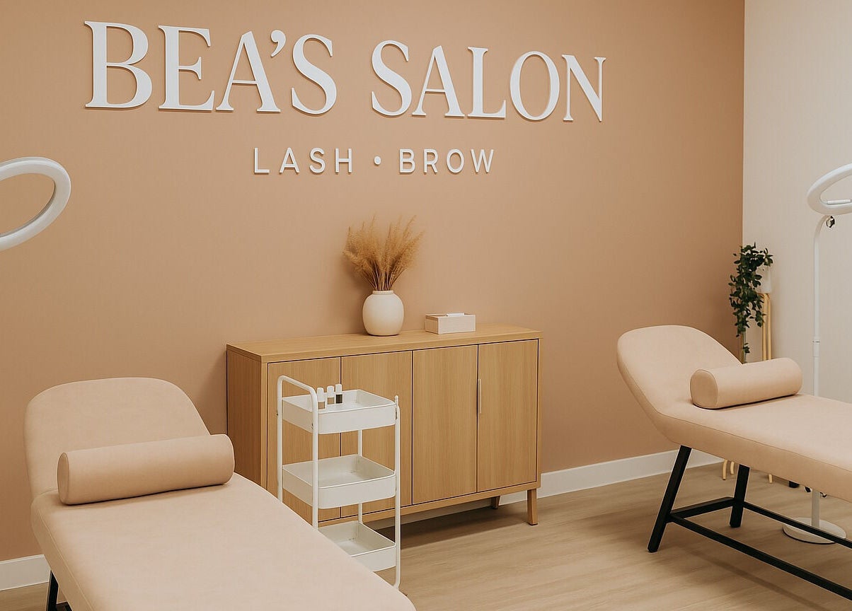 Interior of Bea's Salon in Lagos, NG showing treatment beds, soft lighting, and cozy decor.