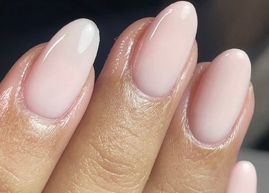 Elegant pink manicure at ByKayla.Sb in Blackpool, England, GB showcasing glossy nail finish.