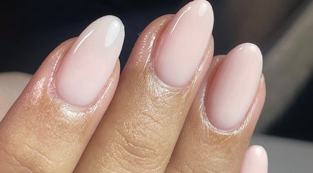 Elegant pink manicure at ByKayla.Sb in Blackpool, England, GB showcasing glossy nail finish.