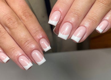French manicure by ByKayla.Sb in Blackpool, England, GB showcasing glossy pink nails with white tips.