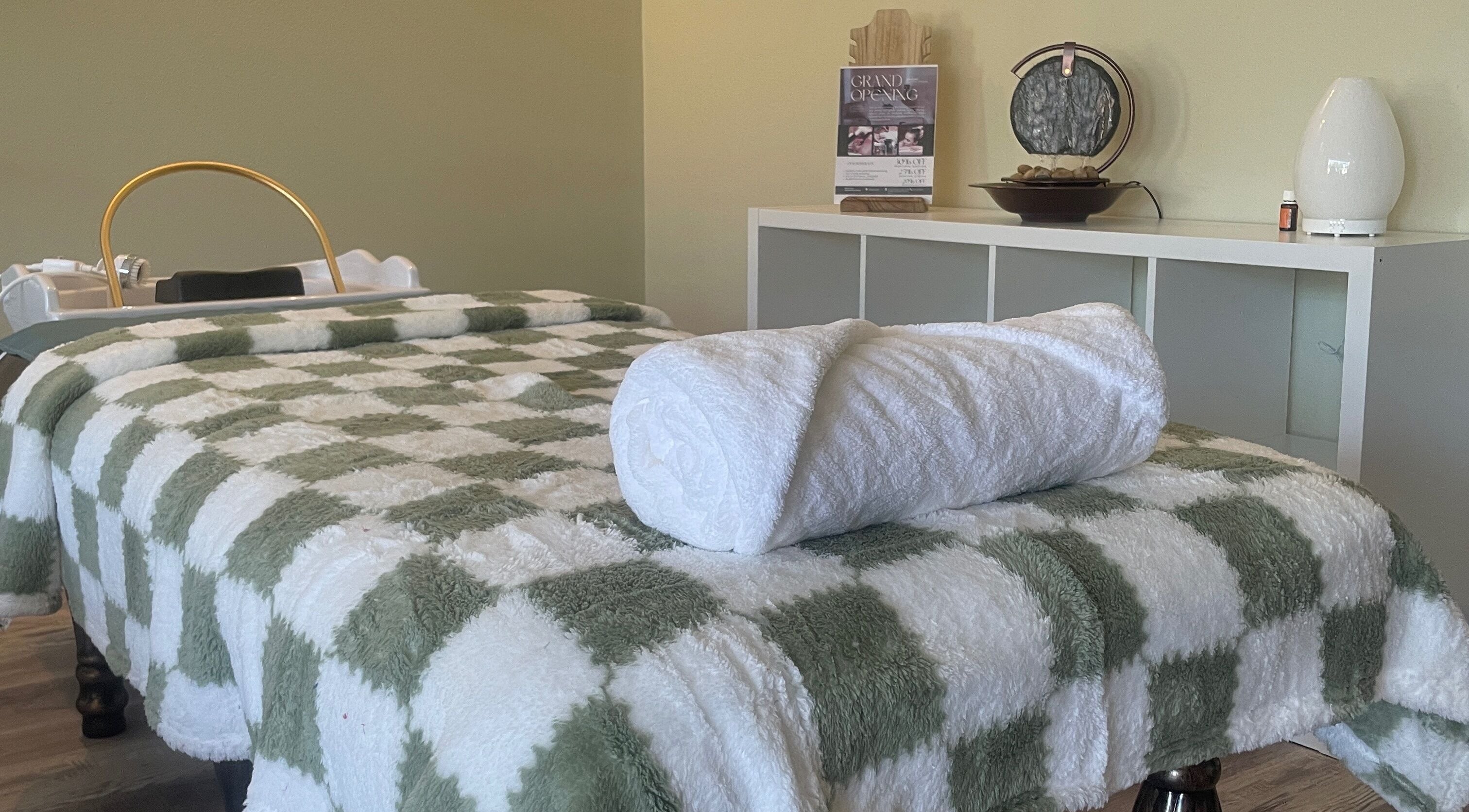 Calming spa room with massage table at Spa Eves | Scalp Spa + Massage in Austin, Texas, US.