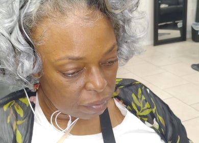 Elegant curly hairstyle at Lux Creative Styles LLC in New Port Richey, Florida, US.