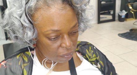 Elegant curly hairstyle at Lux Creative Styles LLC in New Port Richey, Florida, US.