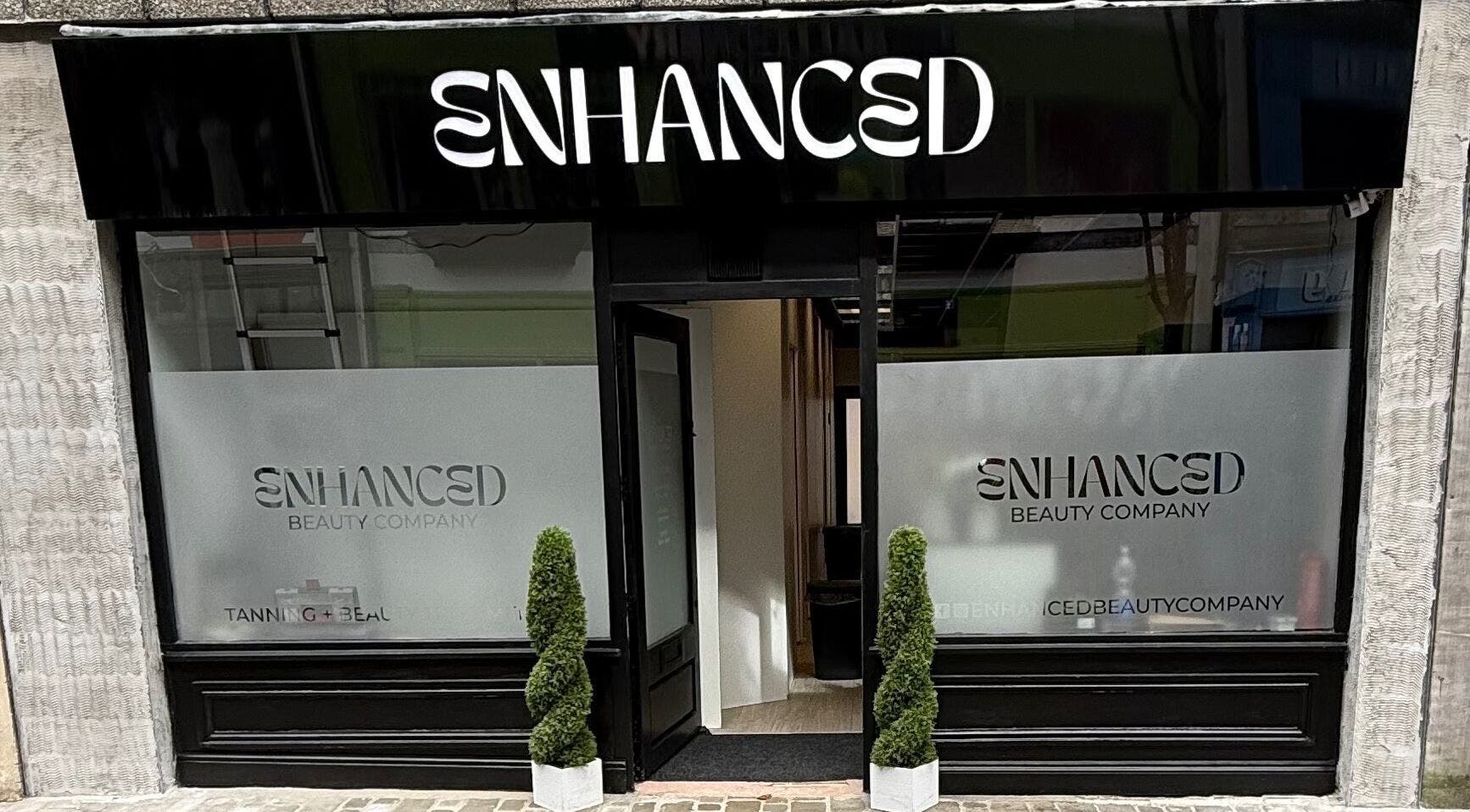 Front view of Enhanced by madison grace in Aberdare, Wales, GB, featuring two potted plants by the entrance.