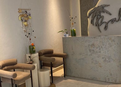 Elegant reception at Bali Nails & Lashes, Al Ain, Abu Dhabi, AE with modern decor and seating.