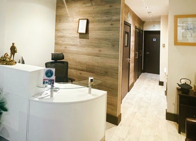 Reception area of Yoganic Thai Spa and Massage, London, England, GB. Features a modern, serene design.