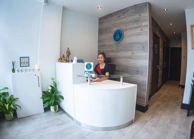Reception desk at Yoganic Thai Spa and Massage, London, England, GB with welcoming atmosphere.