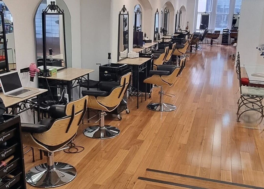 Modern and spacious salon interior at L'Etoile Elite, Sydney, New South Wales, AU with styling stations.