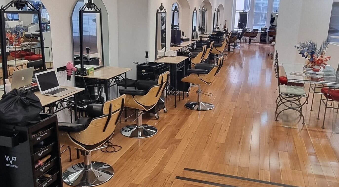 Modern and spacious salon interior at L'Etoile Elite, Sydney, New South Wales, AU with styling stations.