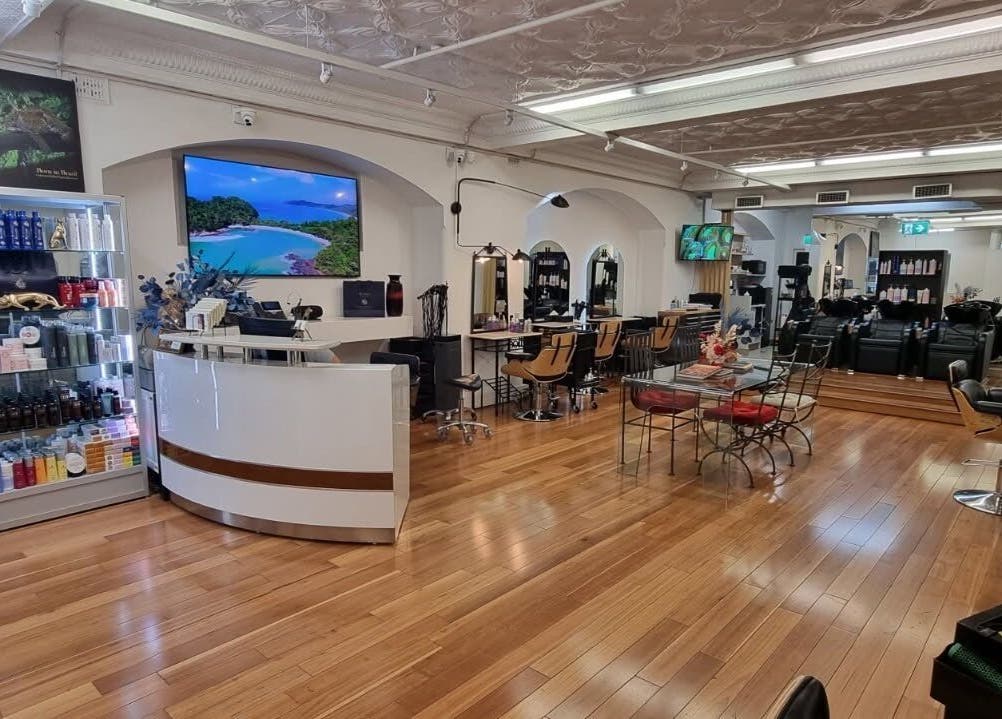 Interior of L'Etoile Elite salon showcasing modern decor and products in Sydney, New South Wales, AU.