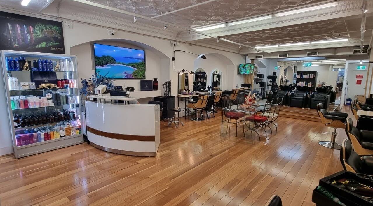 Interior of L'Etoile Elite salon showcasing modern decor and products in Sydney, New South Wales, AU.