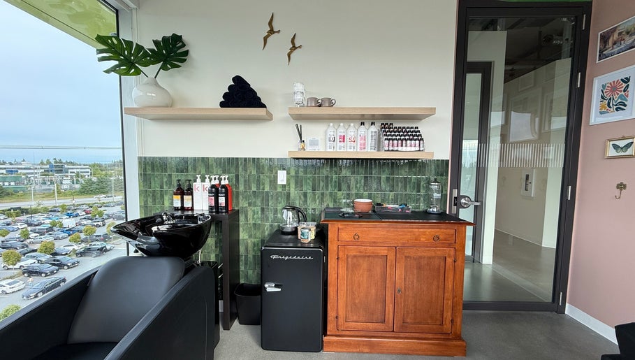 Stylish interior of Summer House Hair Studio in Surrey, British Columbia, CA with chic decor and city view.