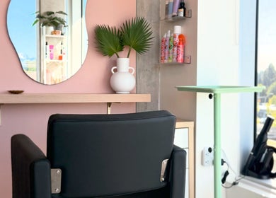Elegant styling chair and mirror at Summer House Hair Studio, Surrey, British Columbia, CA.