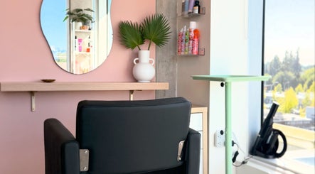 Elegant styling chair and mirror at Summer House Hair Studio, Surrey, British Columbia, CA.