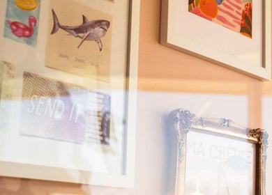 Stylish art decor on a wall inside Summer House Hair Studio, Surrey, British Columbia, CA.