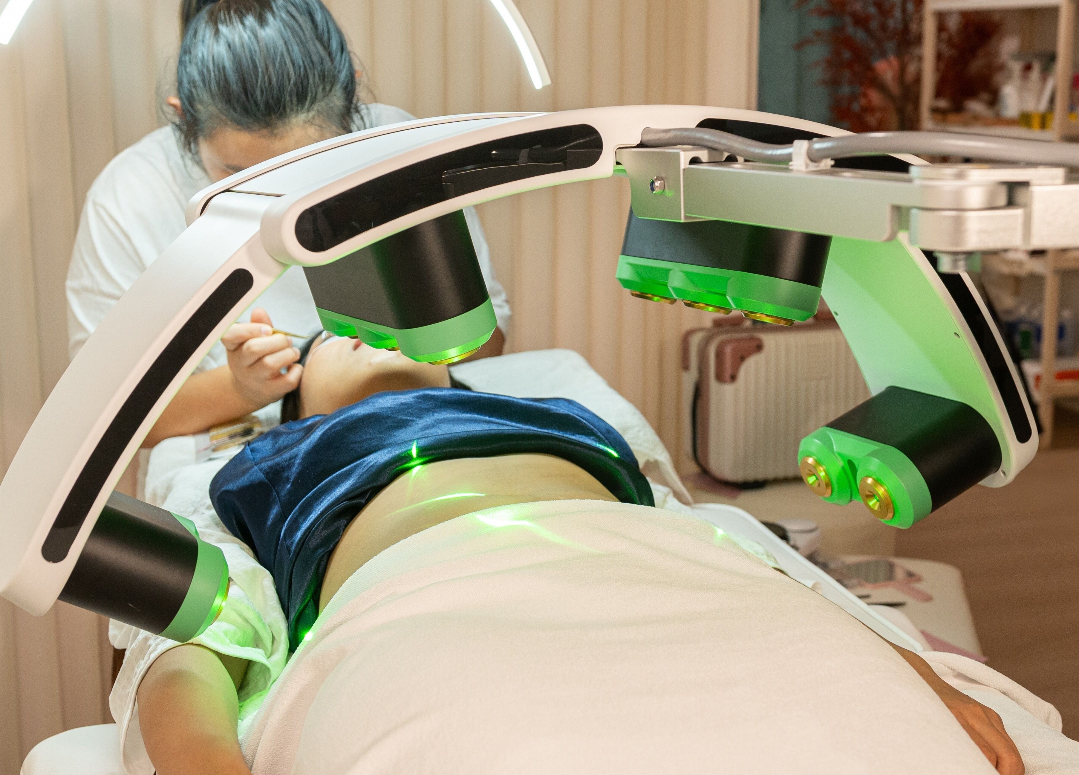 Advanced skin treatment in progress at AURA Hexacube Studio, Singapore, SG with modern laser equipment.