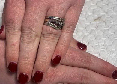 Close-up of elegant deep red nails at Luminous Nails, Everton, Kwazulu-natal, ZA, showcasing trendy manicure.
