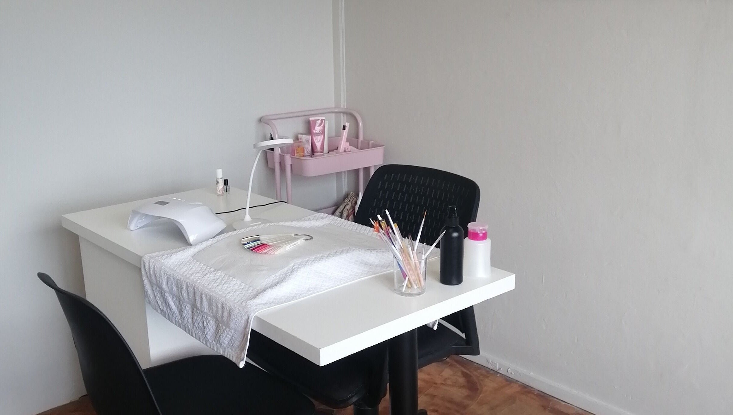 Cozy nail station at Luminous Nails, Outer West Durban, Kwazulu-Natal, ZA, featuring tools and products.