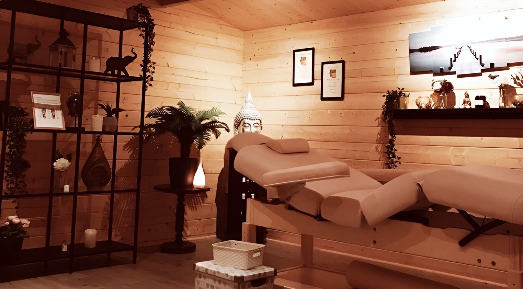 Peaceful massage room at The Relaxation Hub, Dublin, Dublin 4, IE, with a cozy wooden interior.