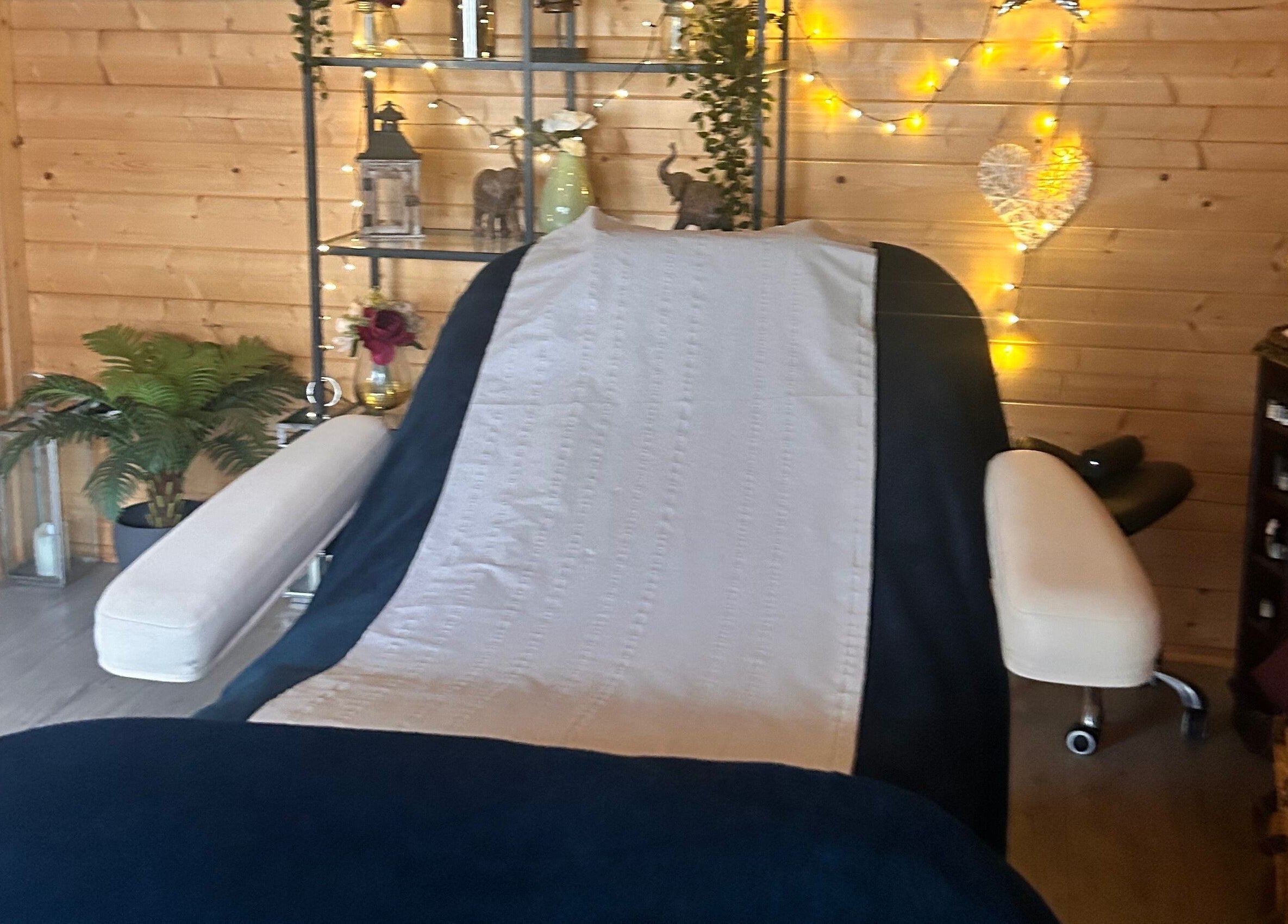 Cozy relaxation area at The Relaxation Hub, Dublin, Dublin 4, IE, with a massage chair and serene decor.