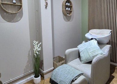 Relaxing wash station at The Salon Sanctuary, Liverpool, England, GB. Minimalist decor enhances tranquility.