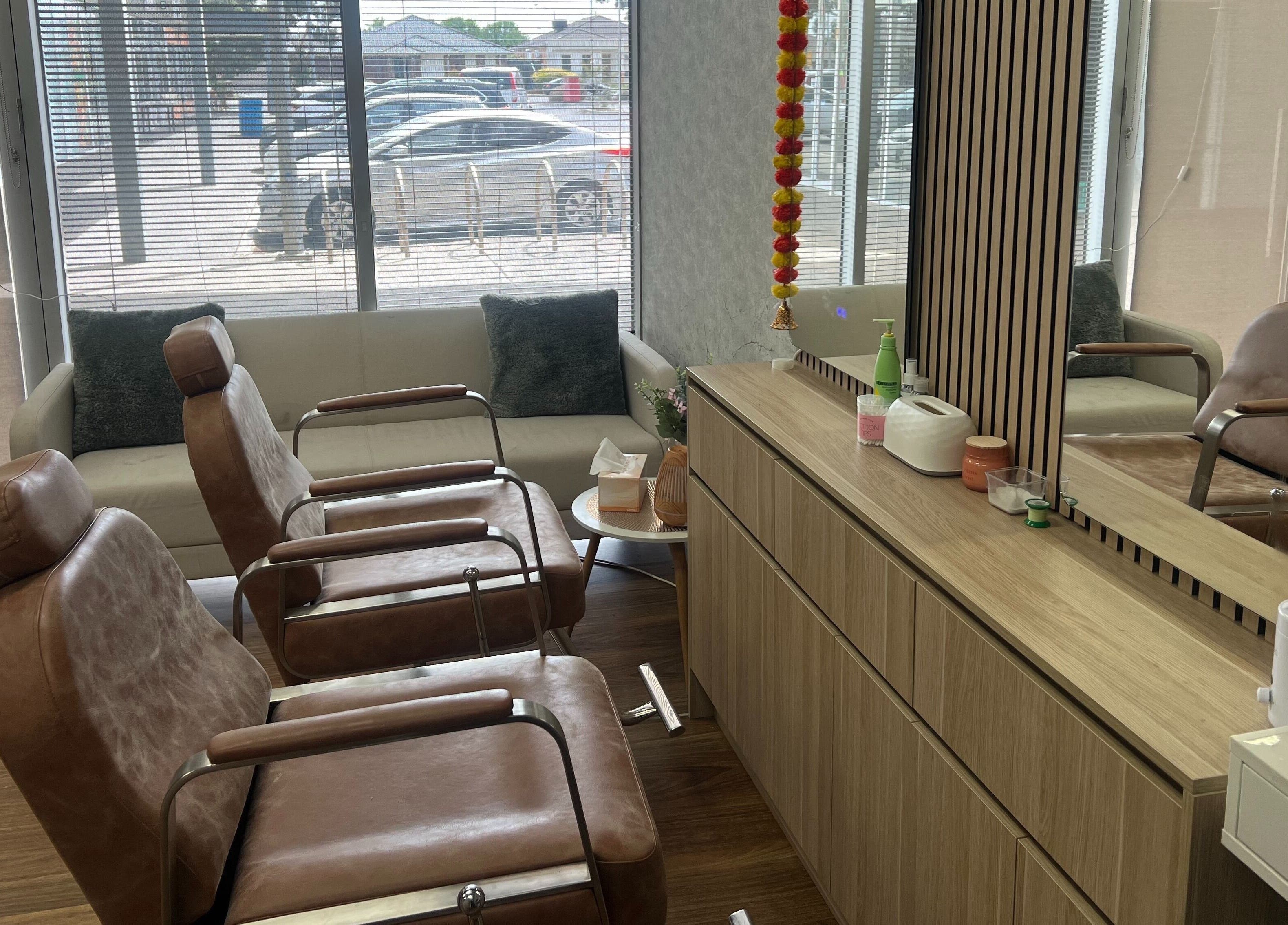 Inviting seating area at OG Lashes Deer Park, Melbourne, Victoria, AU featuring modern chairs and decor.