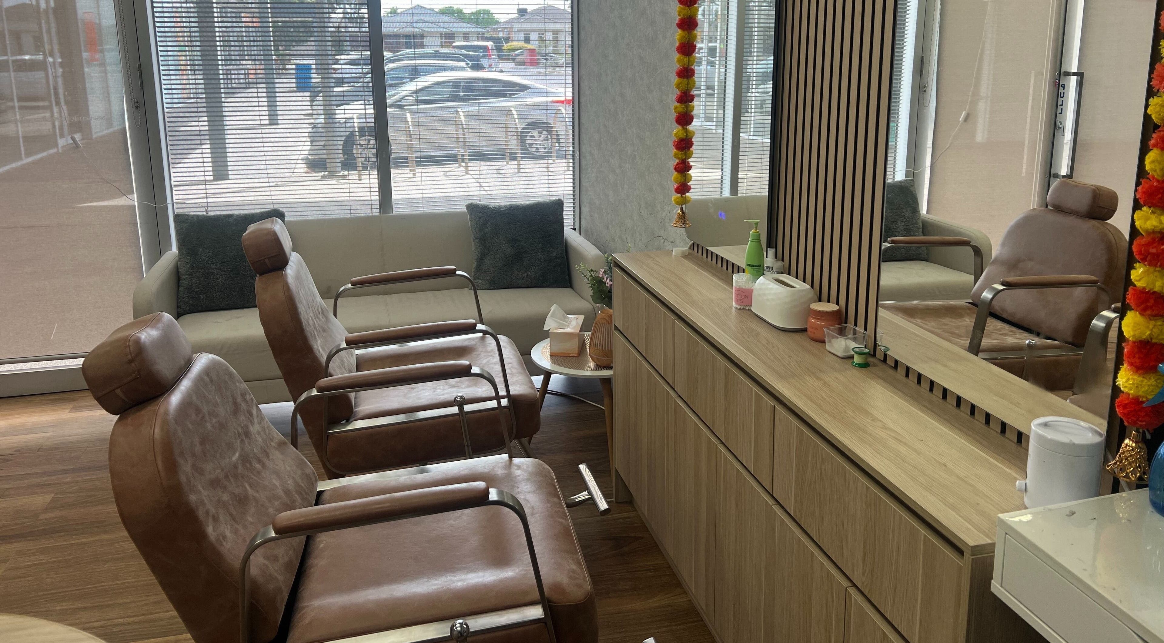 Inviting seating area at OG Lashes Deer Park, Melbourne, Victoria, AU featuring modern chairs and decor.