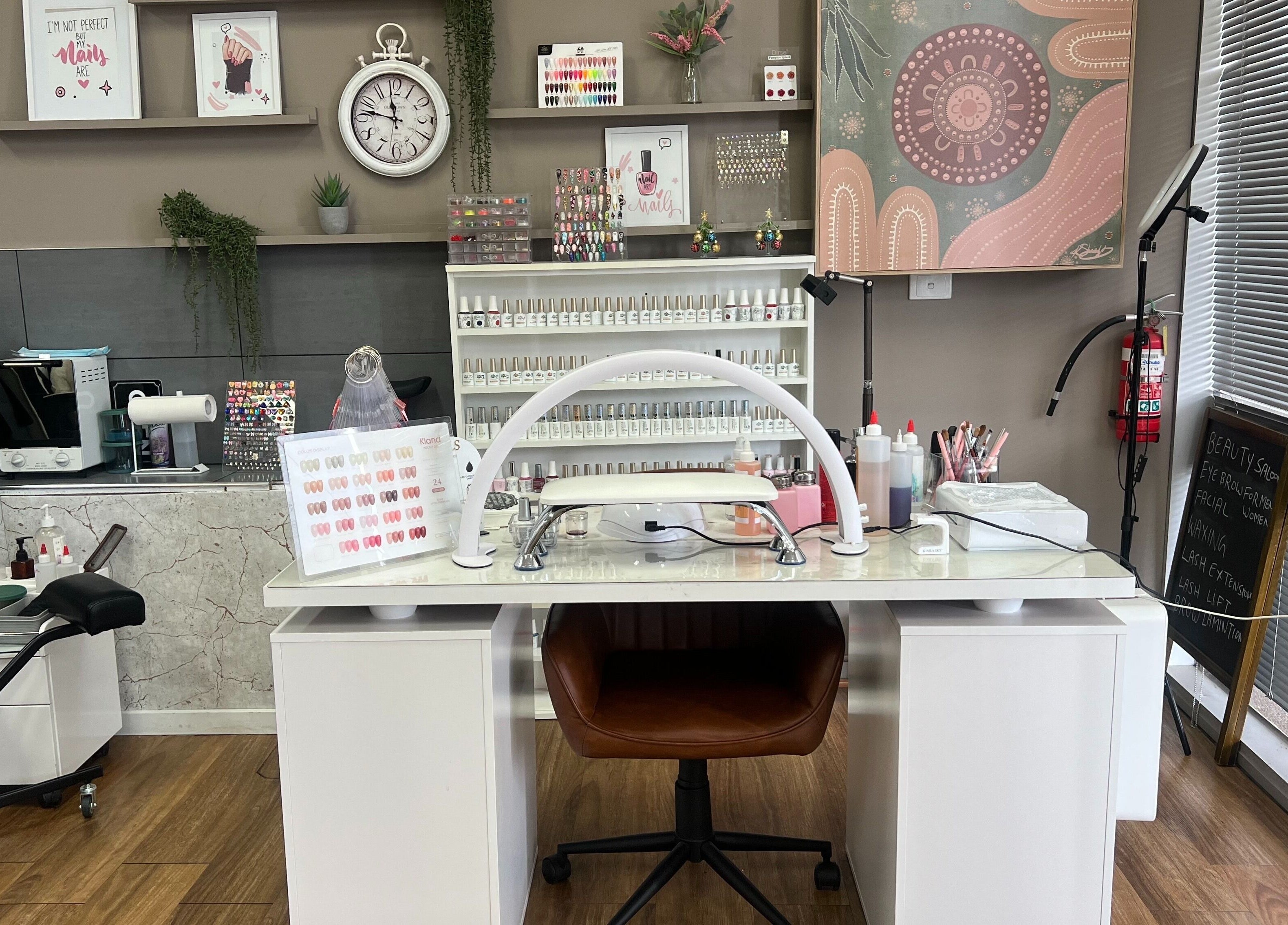 Modern nail station at OG Lashes Deer Park, Melbourne, Victoria, AU showcasing nail polish and decor.