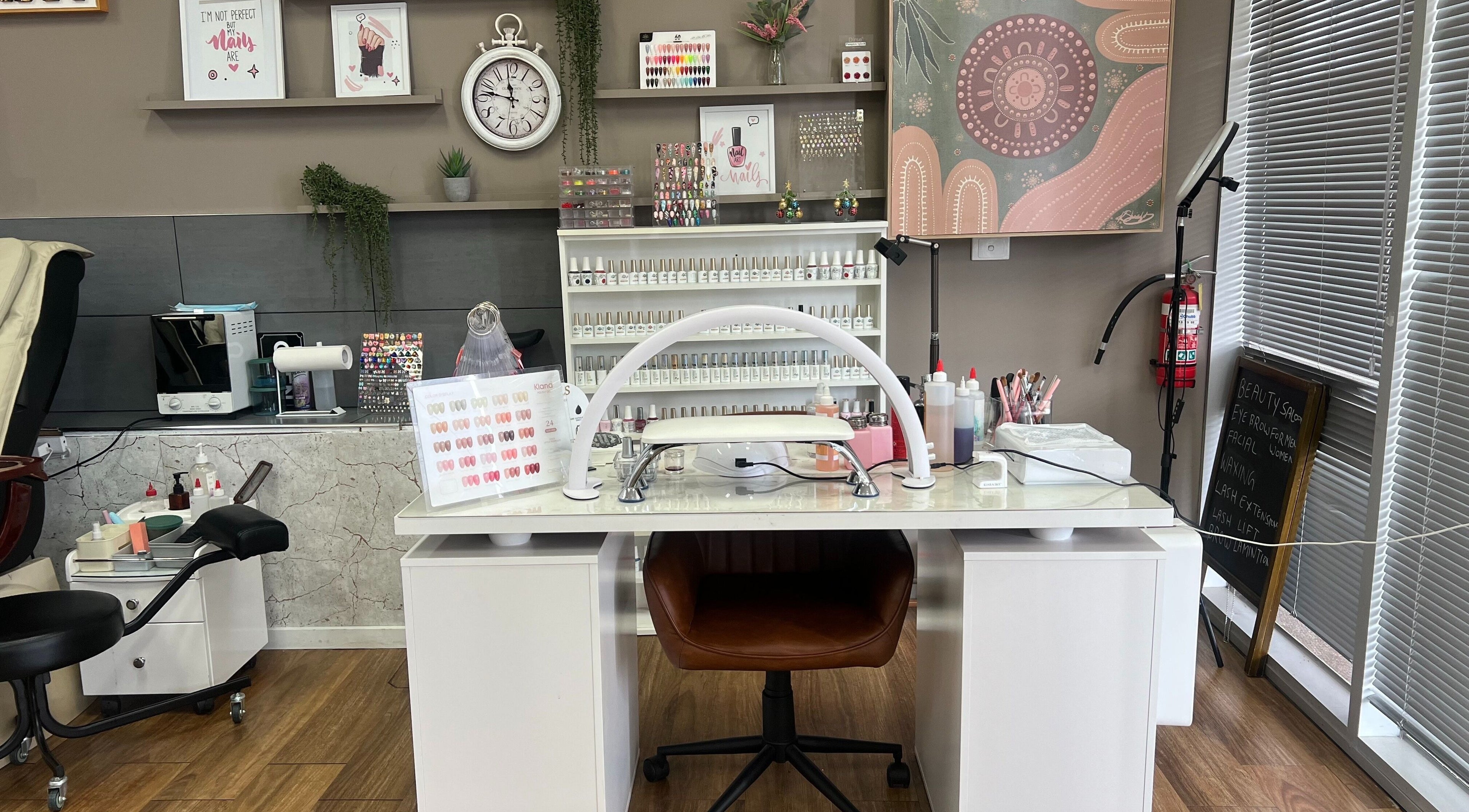 Modern nail station at OG Lashes Deer Park, Melbourne, Victoria, AU showcasing nail polish and decor.