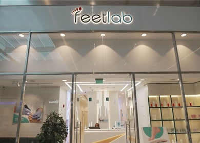 Entrance of Feetlab Podiatry L.L.C at Dubai Hills Mall, Dubai, AE with modern interior design.