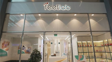 Entrance of Feetlab Podiatry L.L.C at Dubai Hills Mall, Dubai, AE with modern interior design.