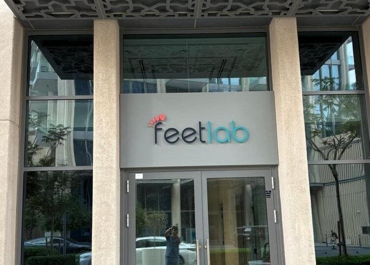Exterior view of Feetlab - Dubai Creek Harbour entrance in Dubai, AE, showcasing modern architecture.