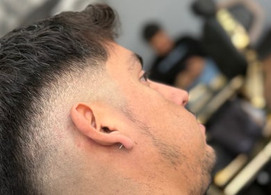 Close-up of a stylish fade haircut at Epic Barber Woking, Woking, England, GB.