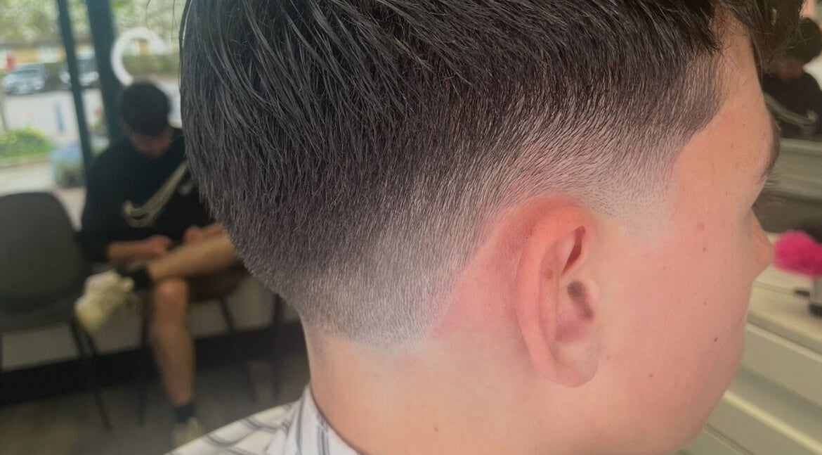 Close-up of a trendy fade haircut at Blend Barbers, Langdon Hills, England, GB.