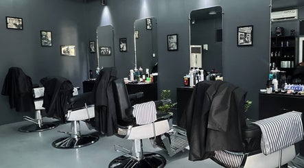 Sleek interior of Culture Barbershop in Mandalay, MM showcasing stylish barber chairs and modern decor.