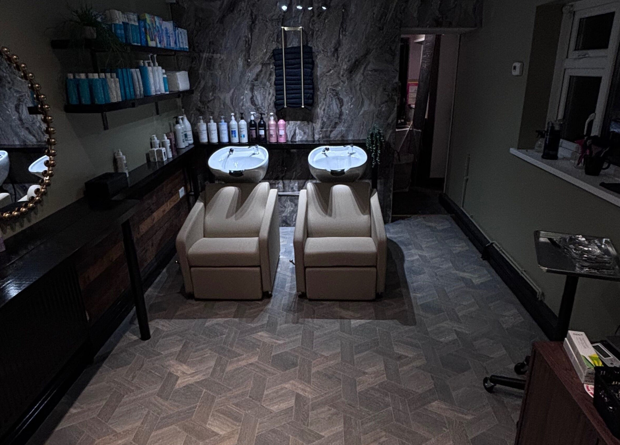 Luxurious washing stations at Another Salon, Swansea, GB, with stylish decor and modern amenities.