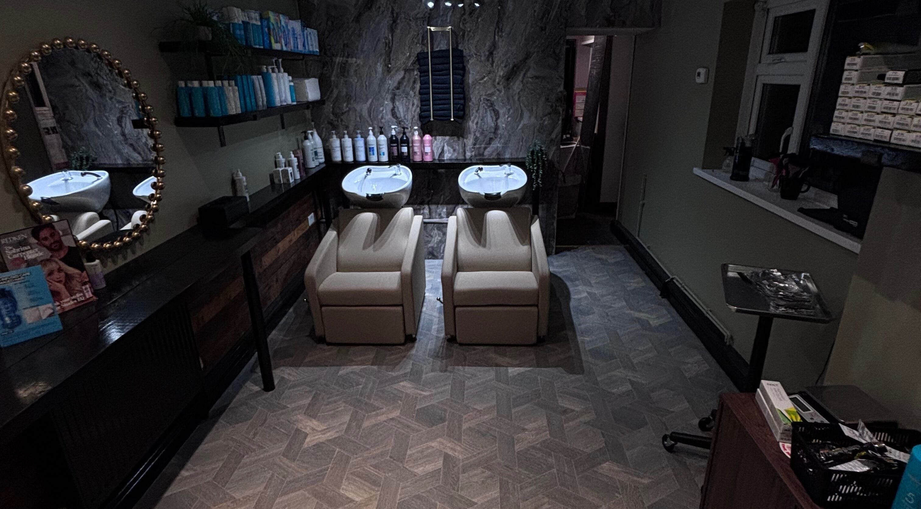 Luxurious washing stations at Another Salon, Swansea, GB, with stylish decor and modern amenities.