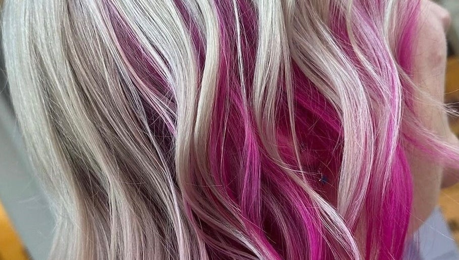 Bright pink and blonde hair styled at EMWHAIR, Newport Pagnell, England, GB.