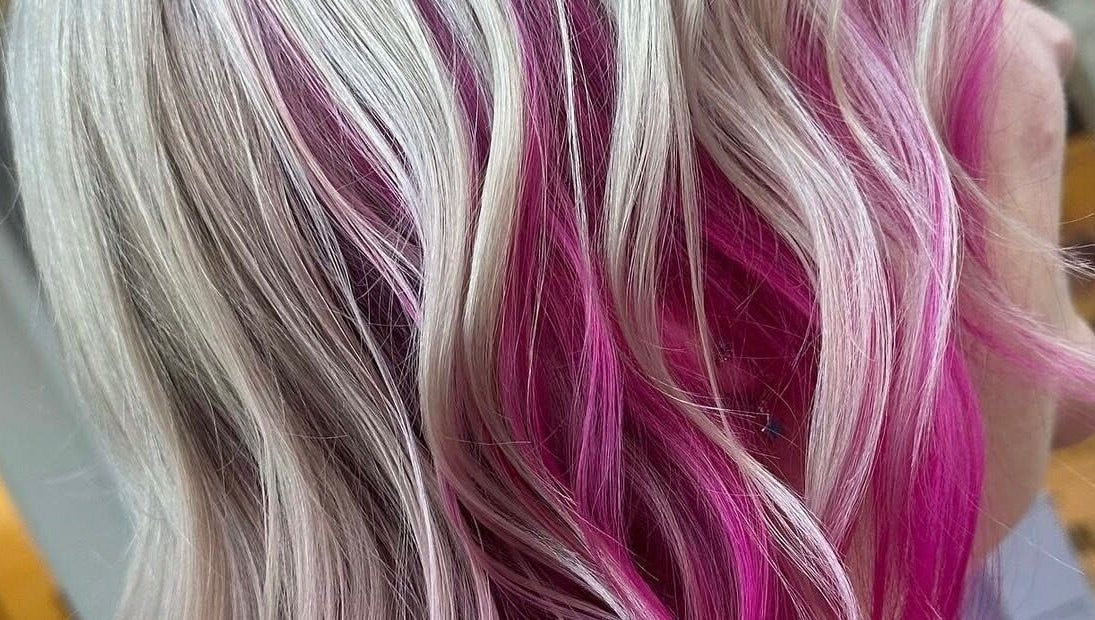 Bright pink and blonde hair styled at EMWHAIR, Newport Pagnell, England, GB.