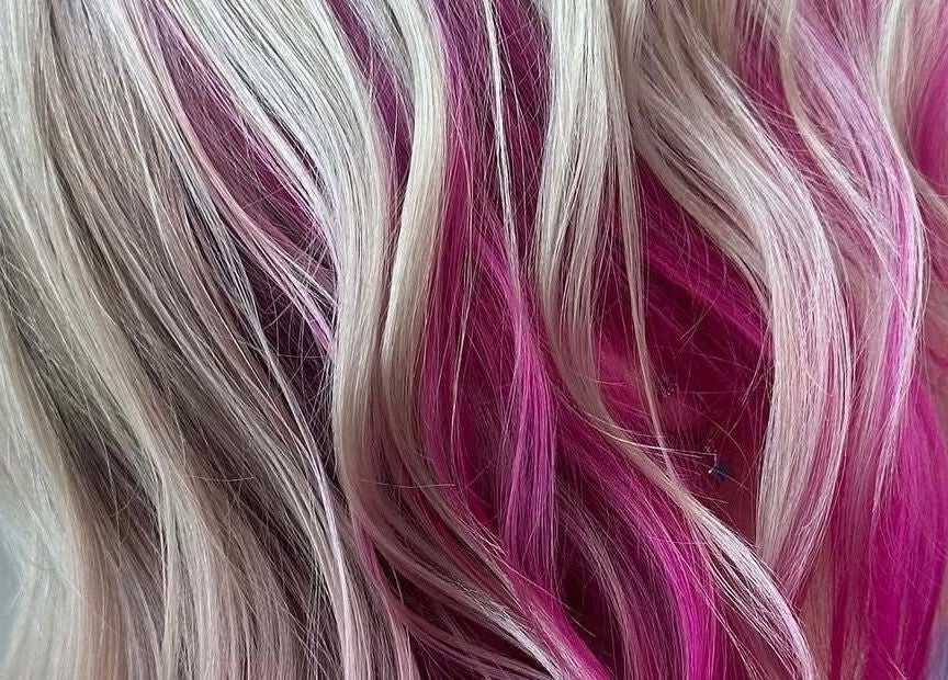 Bright pink and blonde hair styled at EMWHAIR, Newport Pagnell, England, GB.