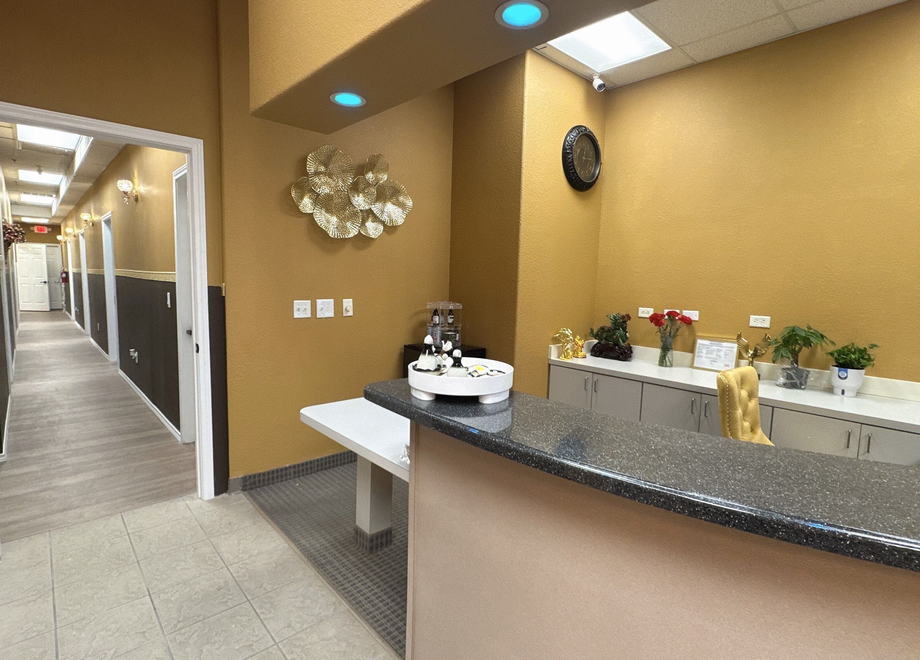 Reception area at Oak Tree Massage and Facial Frisco in Frisco, Texas, US with stylish decor.