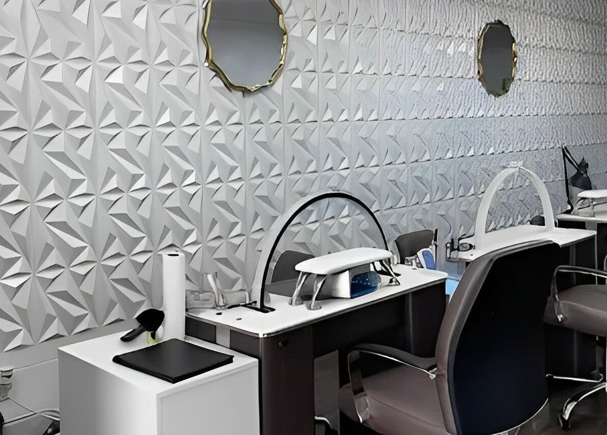 Modern nail salon interior at MY NAILS in Victoria, Texas, US with sleek workstations and mirror decor.