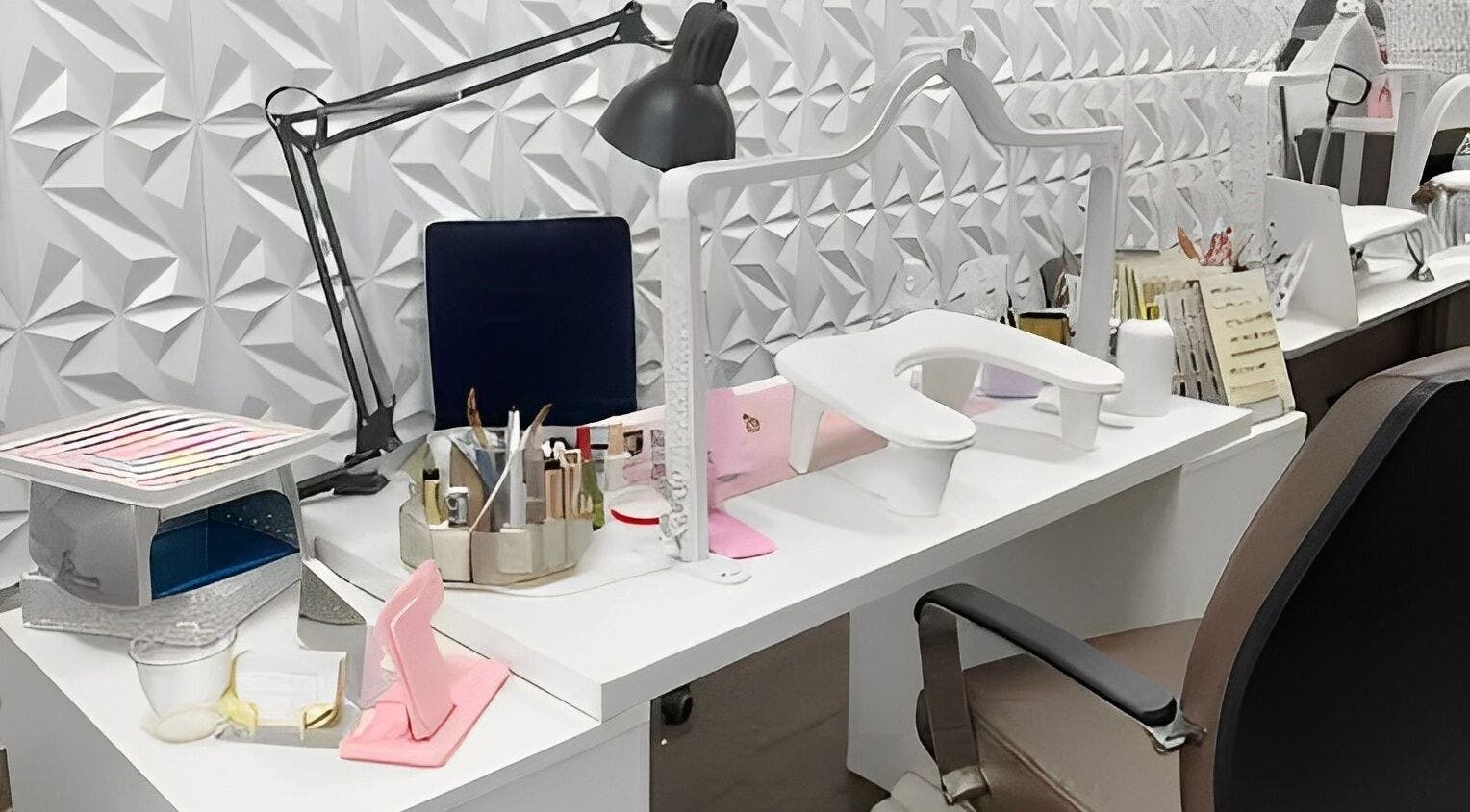 Modern nail station at MY NAILS, Victoria, Texas, US with tools and decor.
