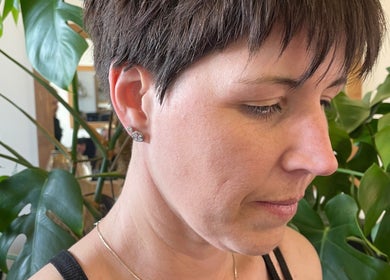 Client at Aaran Sutton Hair with styled short hair in Aberdeen, Scotland, GB.