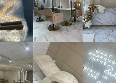 Elegant interior of Aaran Sutton Hair, Aberdeen, Scotland with chic seating and glamorous décor.
